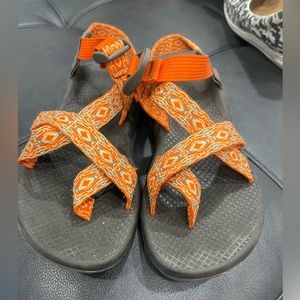 Orange chacos size 7